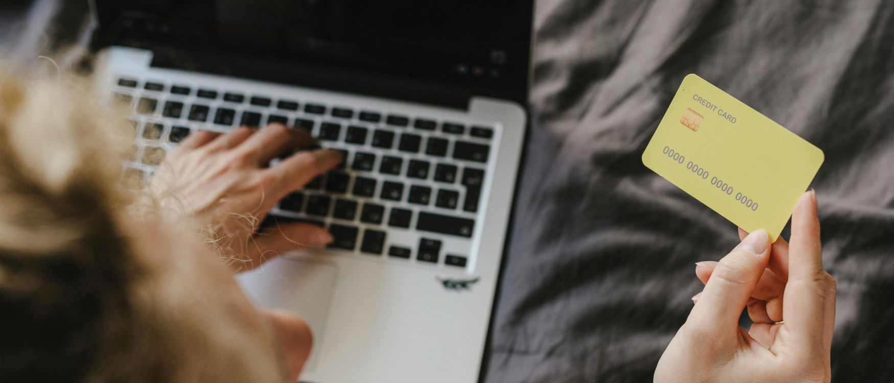 Person holding a credit card